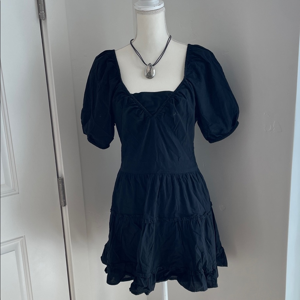 Elegant Black Puff Sleeve Dress. 100% Cotton and skirt is lined. Cute, easy care